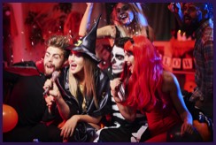 Partygoers in Halloween costumes